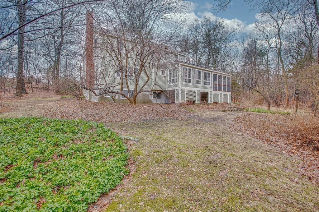 250 Old Littleton Road Harvard, MA 01451 - Photo 10 of 35 a view of a yard in front of a house