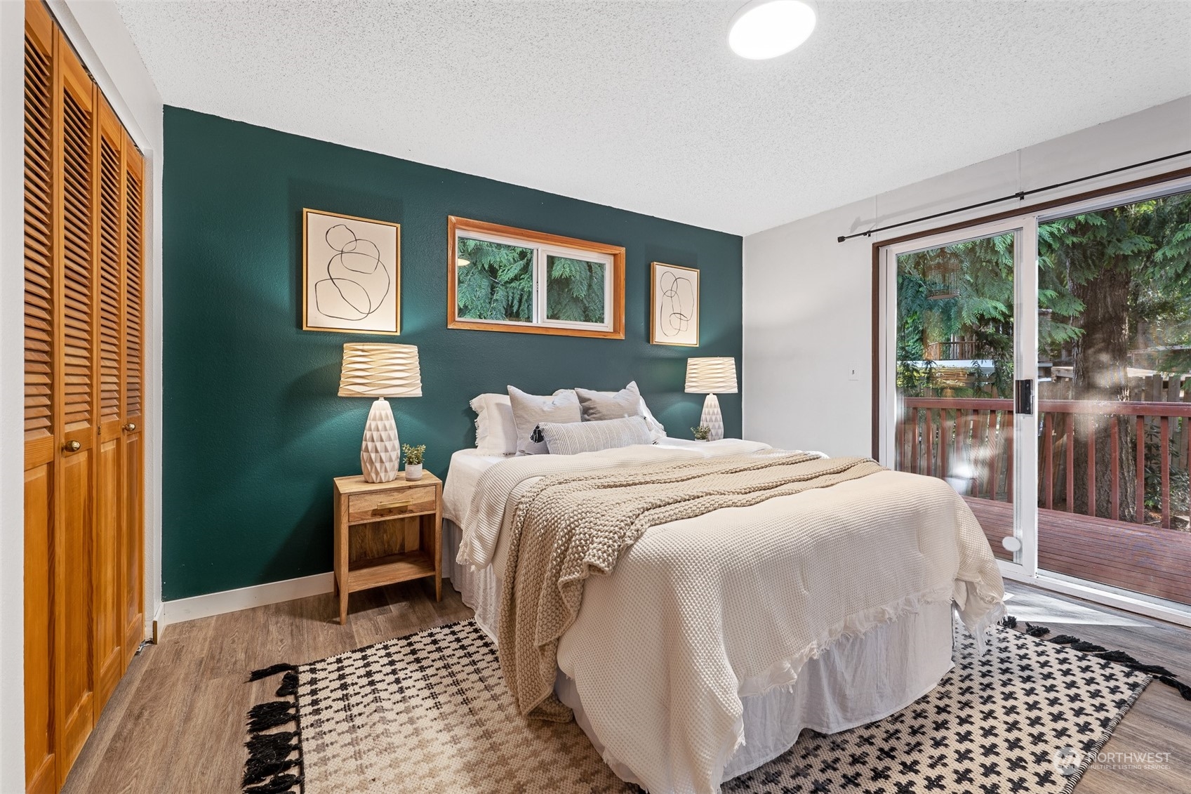 5408 25th Avenue Northwest Gig Harbor, WA 98335 - Photo 11 of 31 a bedroom with a bed and a window