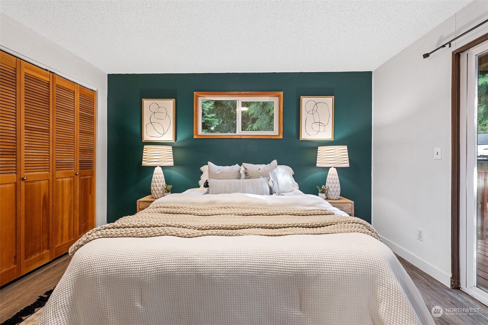 5408 25th Avenue Northwest Gig Harbor, WA 98335 - Photo 12 of 31 a bedroom with a bed and a window