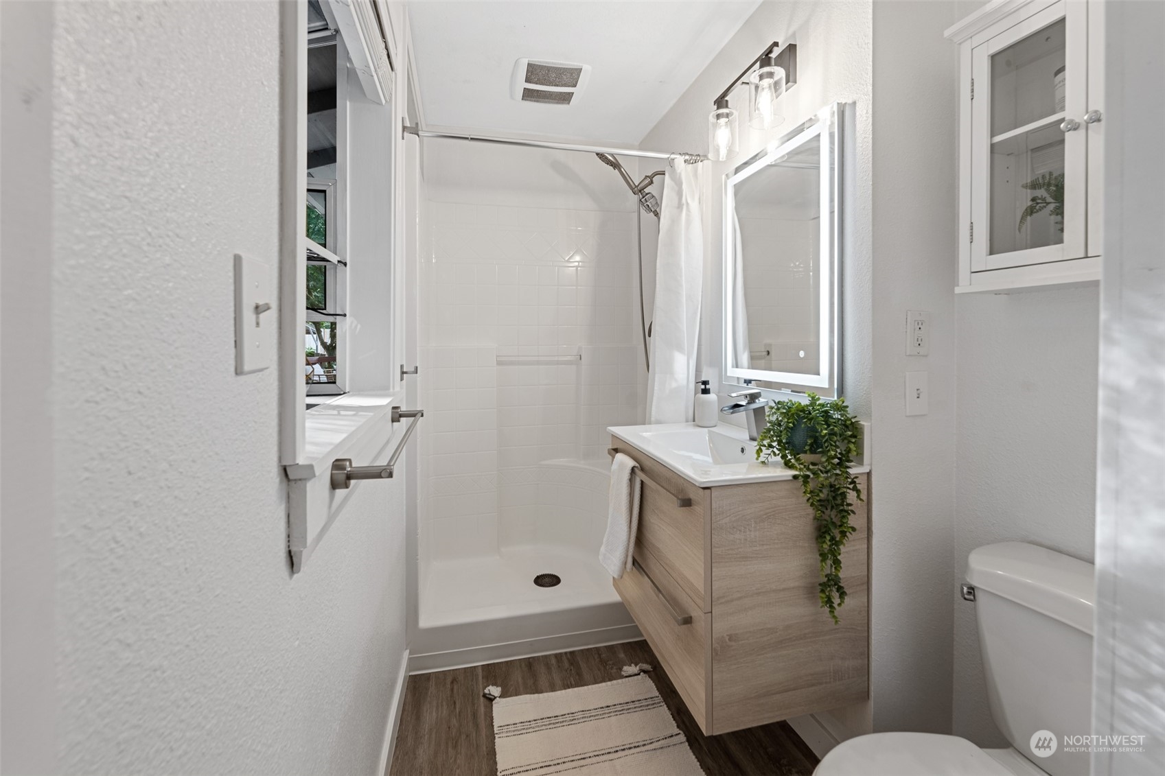 5408 25th Avenue Northwest Gig Harbor, WA 98335 - Photo 14 of 31 a bathroom with a shower and a toilet