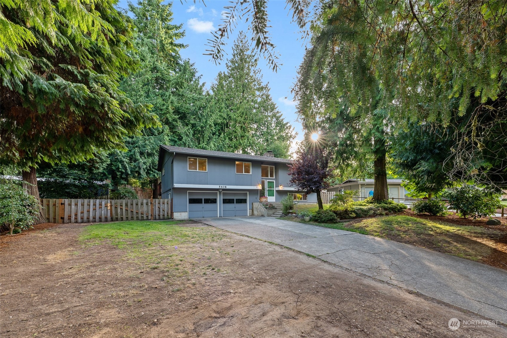 5408 25th Avenue Northwest Gig Harbor, WA 98335 - Photo 2 of 31 a house view with a sitting space and garden