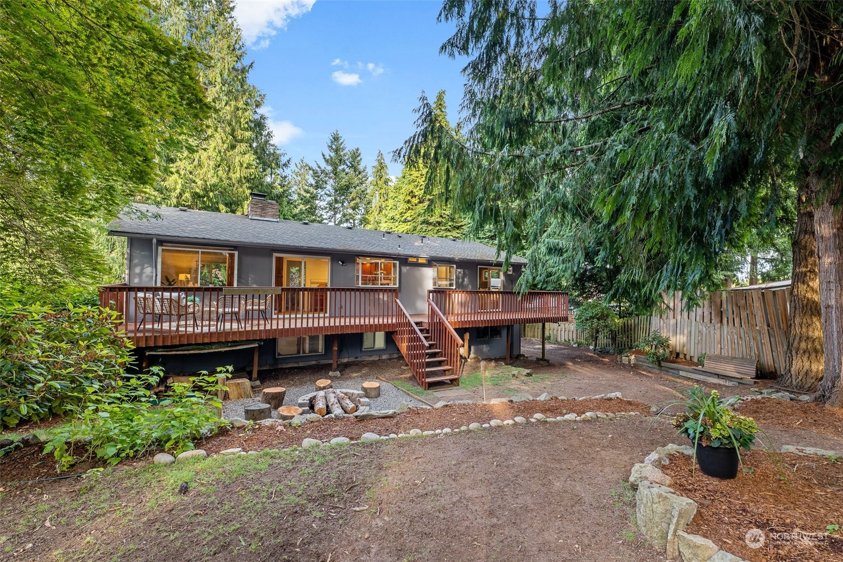 5408 25th Avenue Northwest Gig Harbor, WA 98335 - Photo 28 of 31 a view of a house with a yard and sitting area