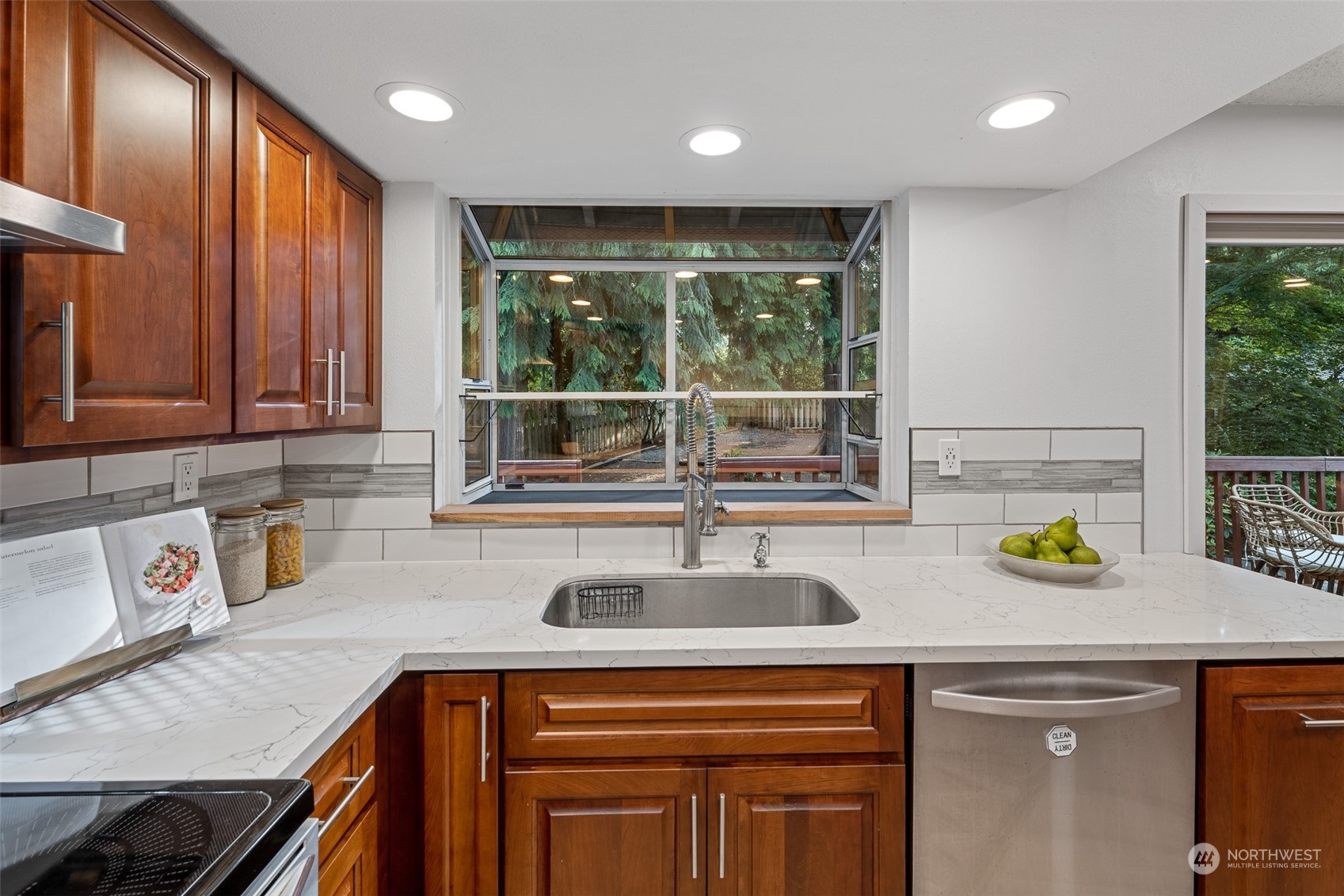 5408 25th Avenue Northwest Gig Harbor, WA 98335 - Photo 6 of 31 a kitchen with a sink and a window