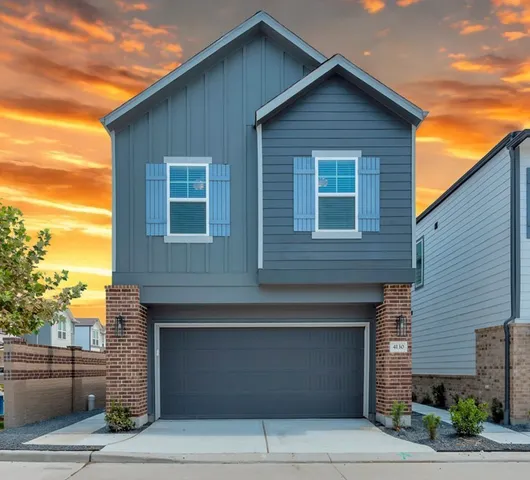 a view of a house with garage