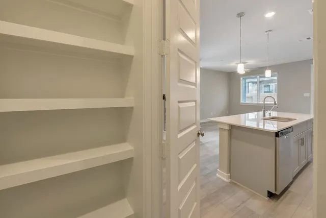 a bathroom with a sink vanity and a mirror