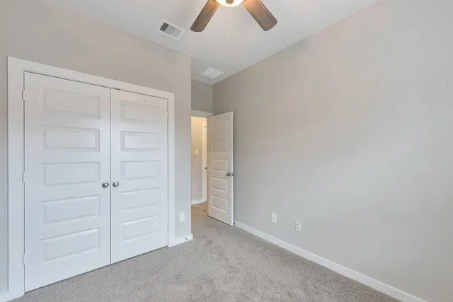 wooden floor and closet in a room