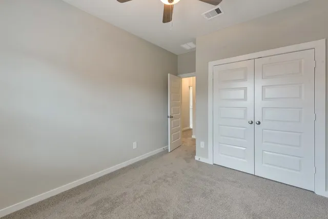 a view of a house with backyard porch and patio