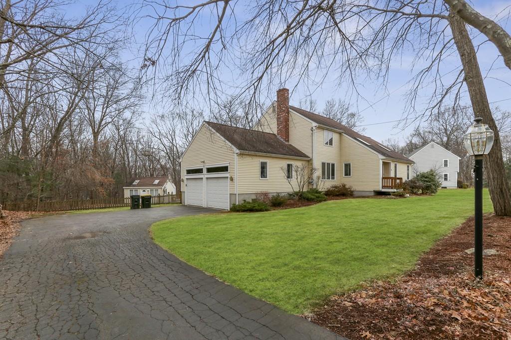 8 Pheasant Hill Road Bellingham, MA 02019 - Photo 1 of 15 a view of a yard in front of house