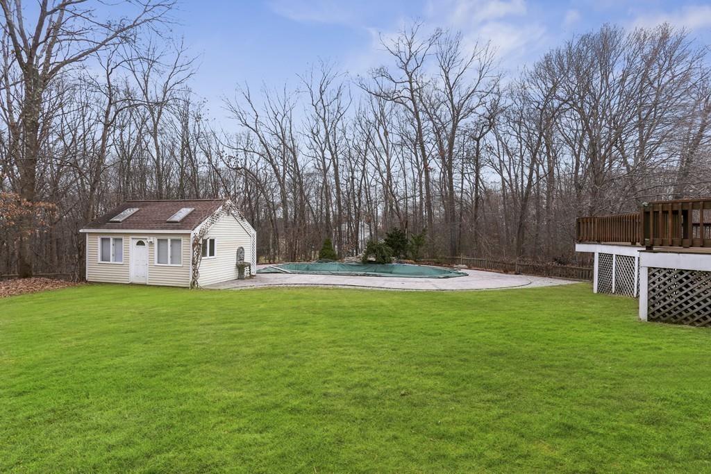 8 Pheasant Hill Road Bellingham, MA 02019 - Photo 12 of 15 a view of a house with a yard