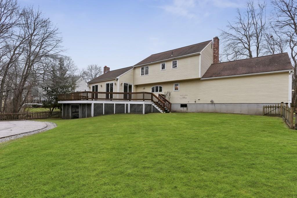 8 Pheasant Hill Road Bellingham, MA 02019 - Photo 13 of 15 a view of a house with backyard and garden