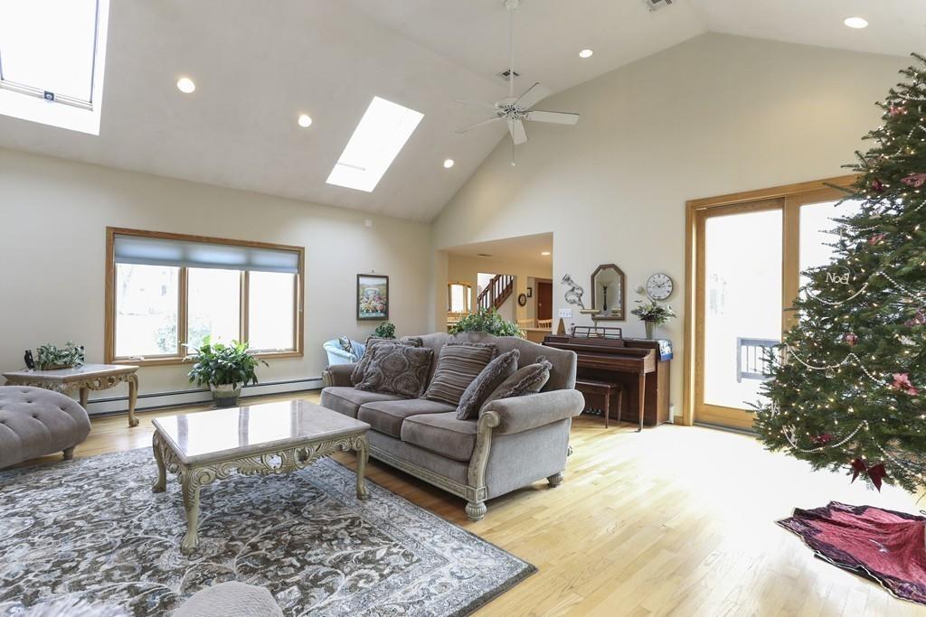 8 Pheasant Hill Road Bellingham, MA 02019 - Photo 5 of 15 a living room with furniture and a large window