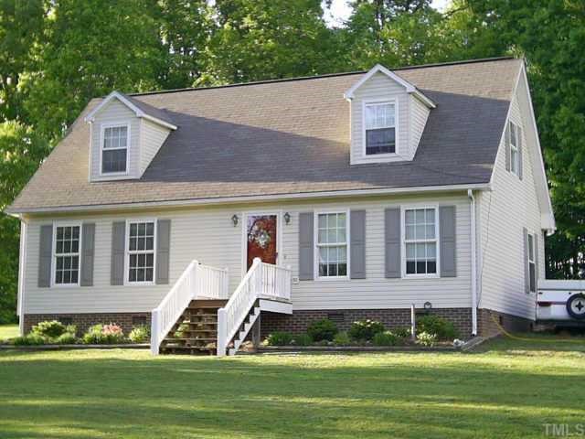 1641 Cedar Grove Church Road Roxboro, NC 27574 - Photo 1 of 1 a view of a house with a yard