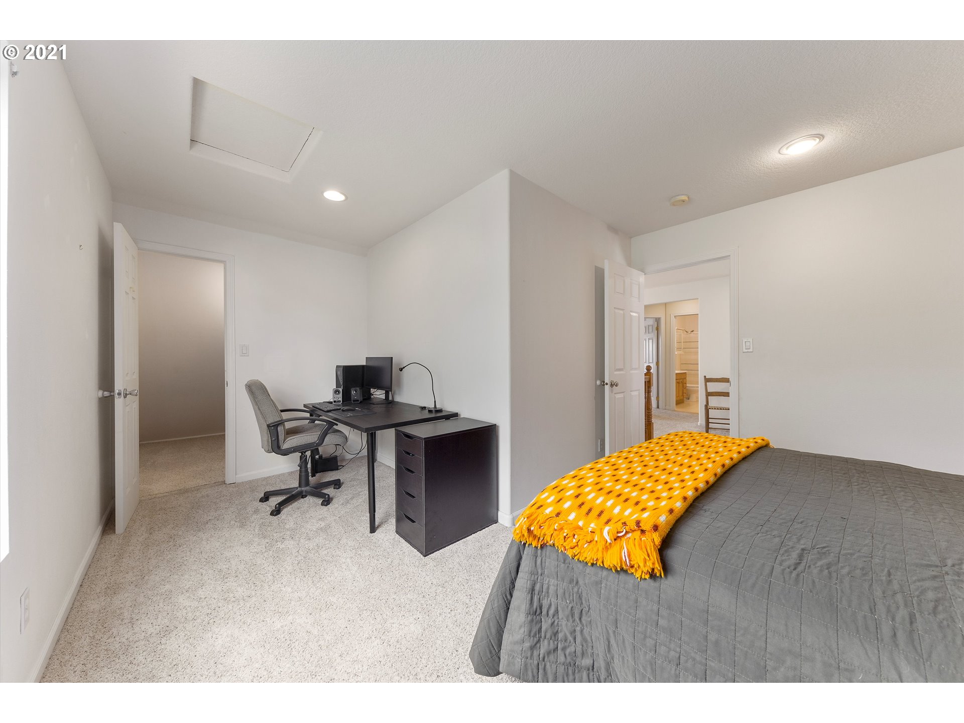 20925 South Ridge Road Oregon City, OR 97045 - Photo 22 of 32 a bedroom with a bed and a desk