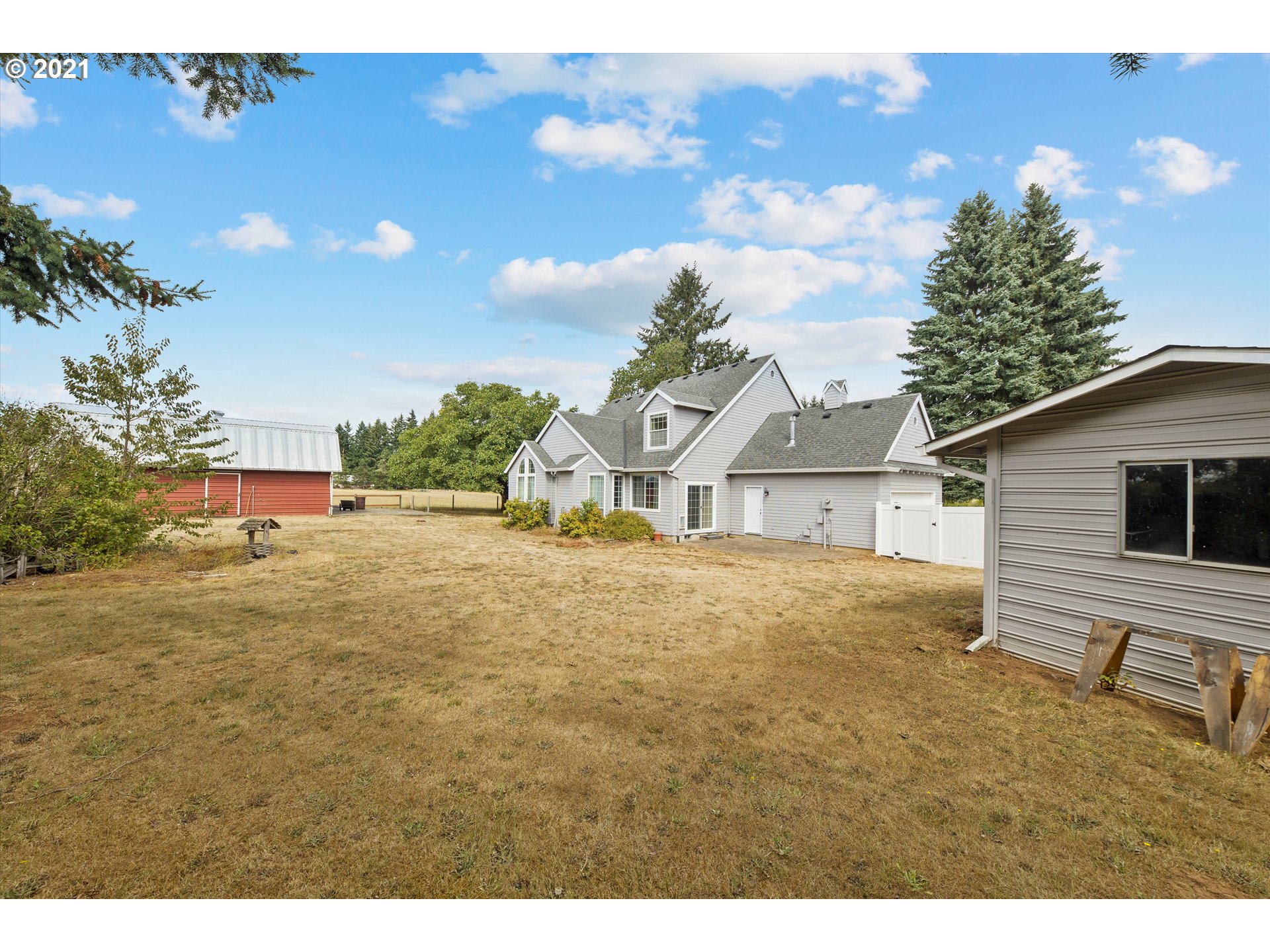 20925 South Ridge Road Oregon City, OR 97045 - Photo 29 of 32 a view of a house with a yard