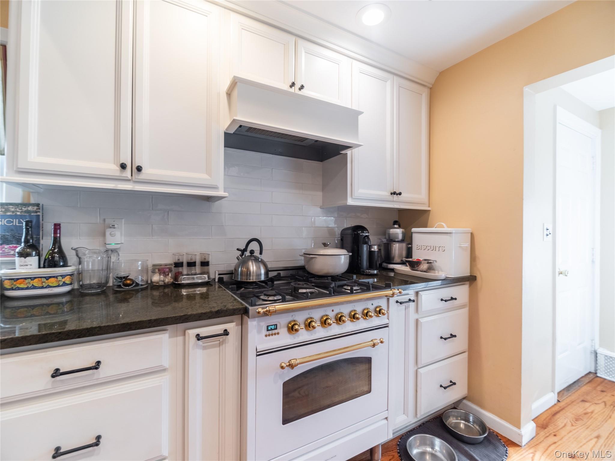 8 Ridgeland Terrace Rye, NY 10580 - Photo 10 of 22 Kitchen featuring Italian style 30"white range