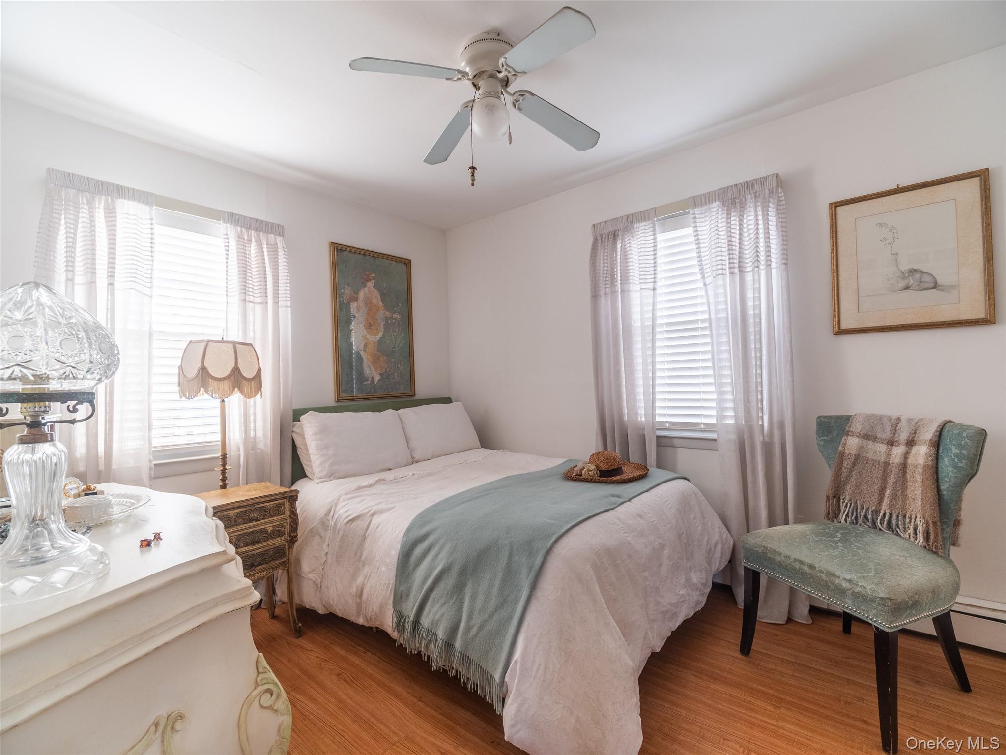 8 Ridgeland Terrace Rye, NY 10580 - Photo 16 of 22 Bedroom featuring wood finished floors and ceiling fan