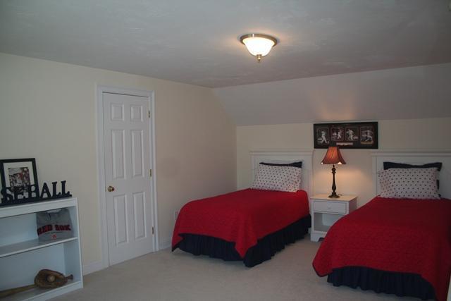 14 Bailey's Path Chatham, MA 02633 - Photo 15 of 20 a bedroom with two beds and a closet