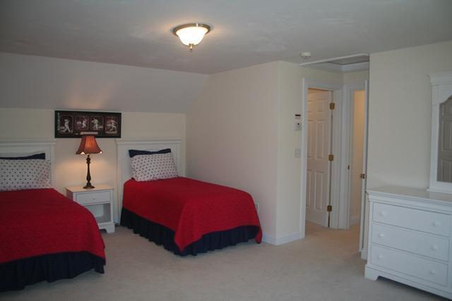14 Bailey's Path Chatham, MA 02633 - Photo 16 of 20 a bedroom with two beds and painted walls