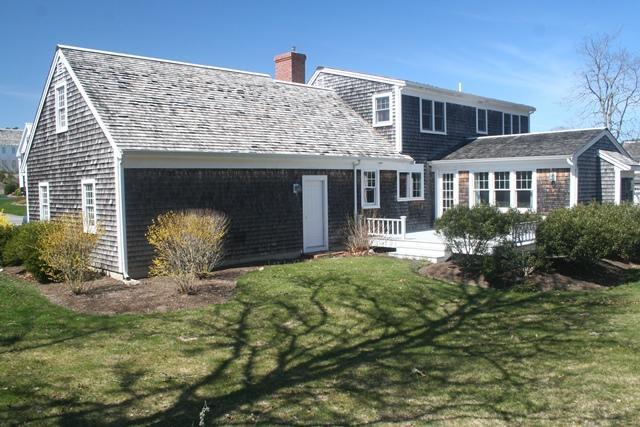 14 Bailey's Path Chatham, MA 02633 - Photo 17 of 20 a front view of house with yard and seating space