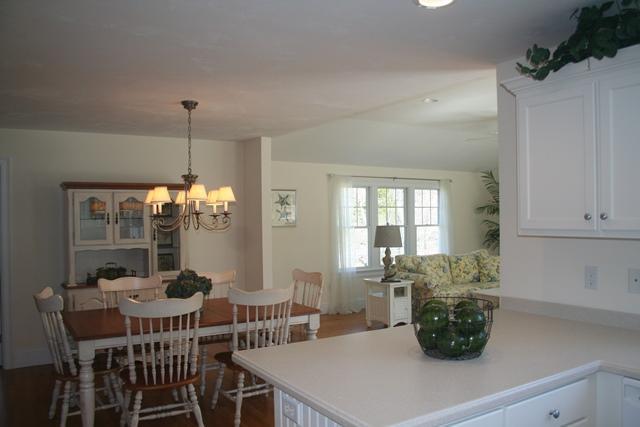 14 Bailey's Path Chatham, MA 02633 - Photo 3 of 20 a view of a dining room with furniture and chandelier