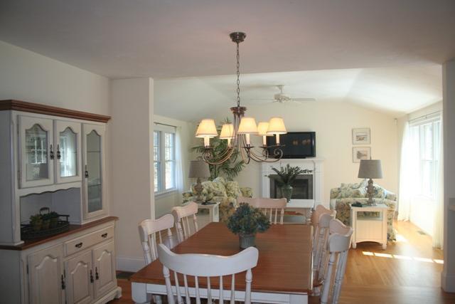 14 Bailey's Path Chatham, MA 02633 - Photo 6 of 20 a dining room with furniture a chandelier and wooden floor