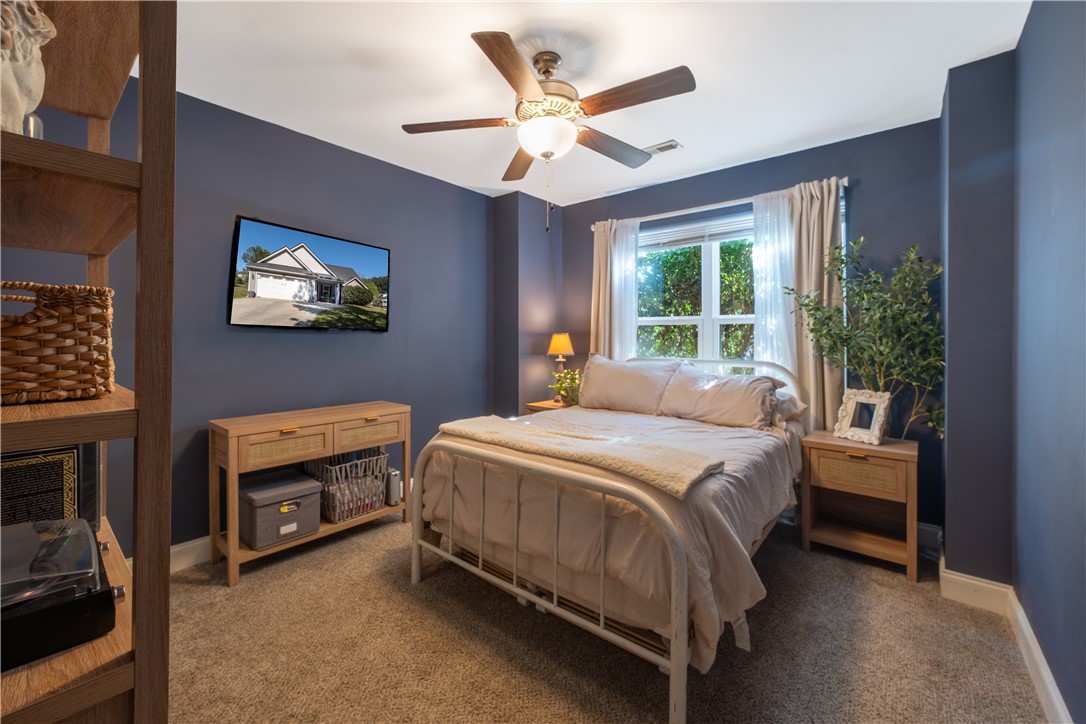 400 Green View Court Westminster, SC 29693 - Photo 9 of 33 This serene bedroom offers a comfortable retreat with ample natural light.