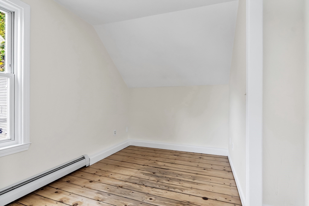 6 Dexter Street Haverhill, MA 01830 - Photo 27 of 42 a view of empty room with wooden floor