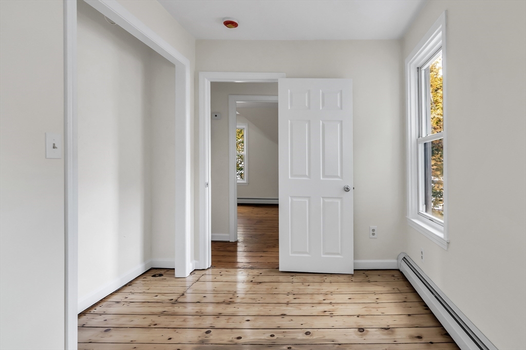 6 Dexter Street Haverhill, MA 01830 - Photo 28 of 42 a view of an empty room with closet and a window
