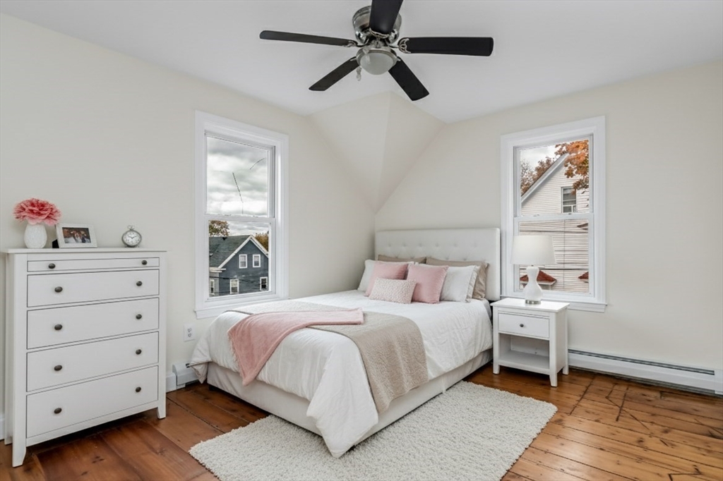 6 Dexter Street Haverhill, MA 01830 - Photo 32 of 42 a bedroom with a bed and a dresser