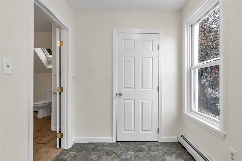 6 Dexter Street Haverhill, MA 01830 - Photo 36 of 42 an empty room with windows and closet