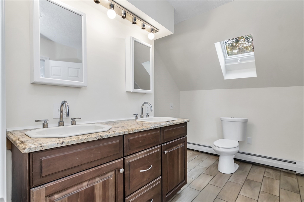 6 Dexter Street Haverhill, MA 01830 - Photo 37 of 42 a bathroom with a sink and a toilet