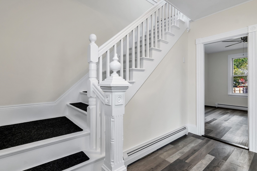 6 Dexter Street Haverhill, MA 01830 - Photo 4 of 42 a view of entryway and hall with wooden floor