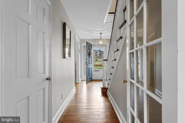 a view of a hallway with a white walls