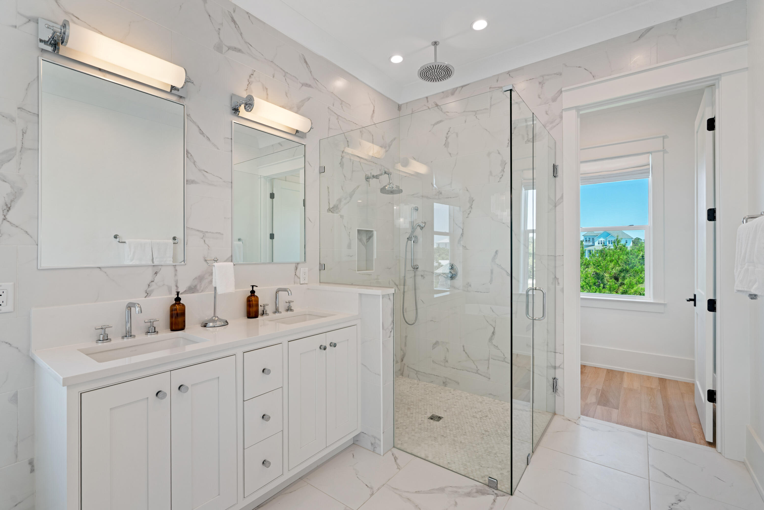 16 Bluewater View Ave Inlet Beach Inlet Beach, FL 32461 - Photo 10 of 59 a spacious bathroom with a shower sink double and mirror