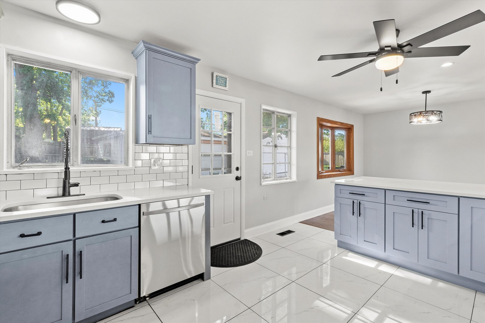 325 Indiana Street Park Forest, IL 60466 - Photo 12 of 28 a spacious bathroom with a granite countertop sink mirror and