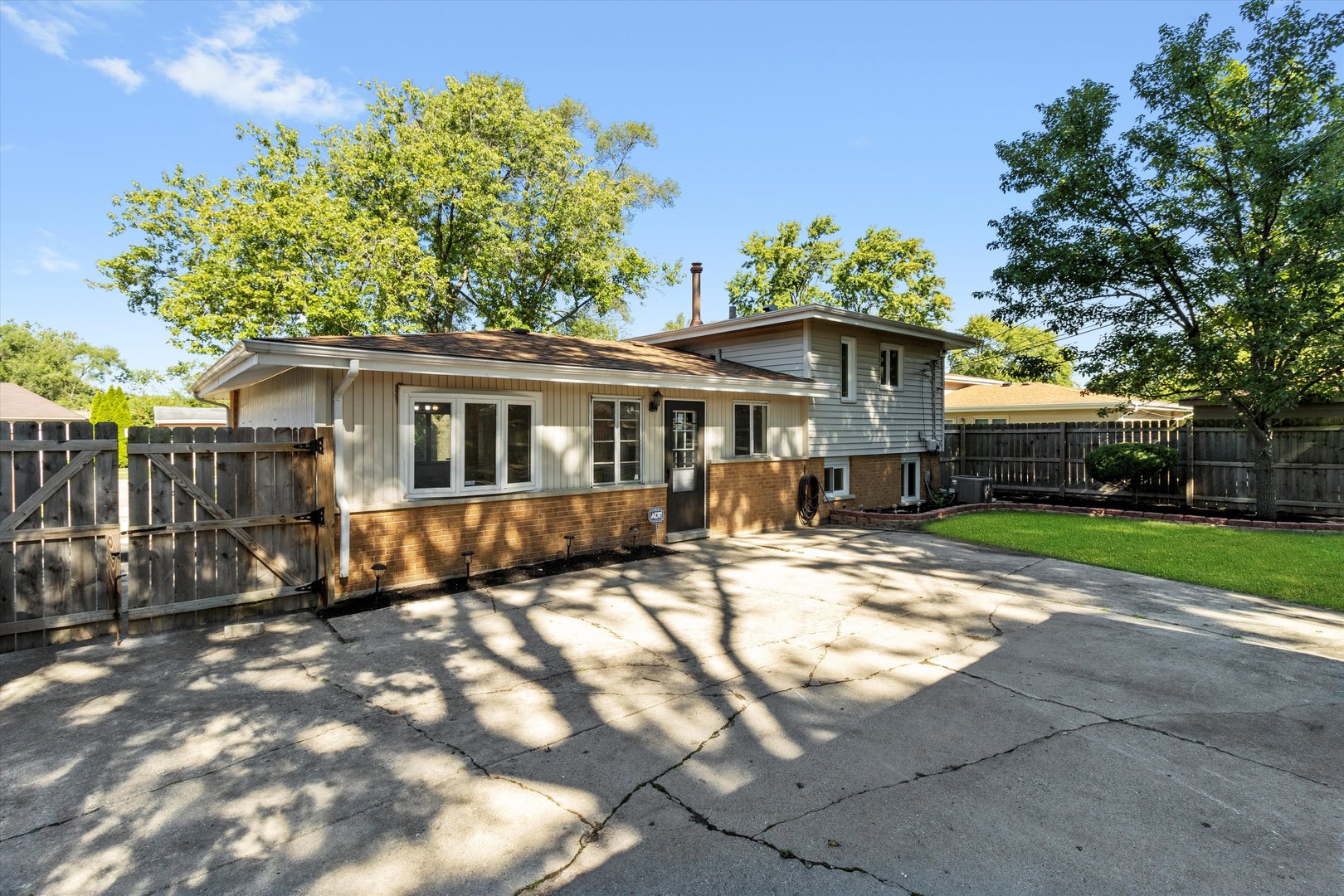325 Indiana Street Park Forest, IL 60466 - Photo 25 of 28 a view of a house with a yard