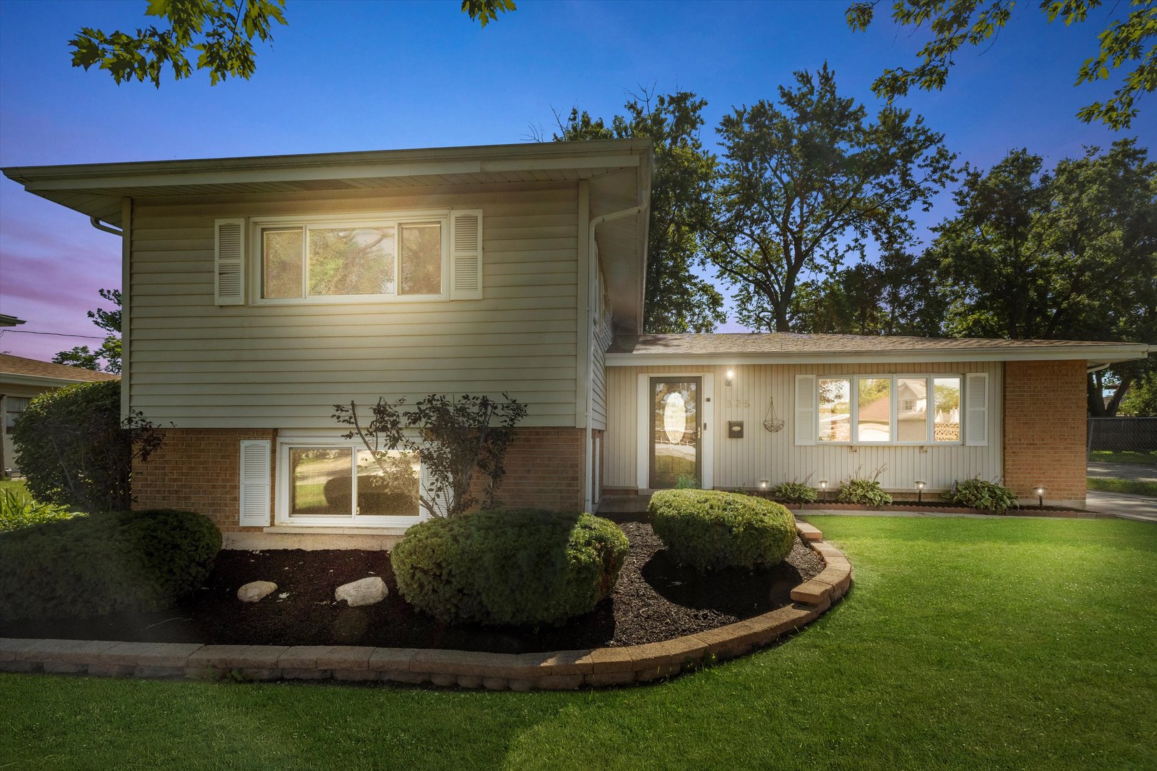 325 Indiana Street Park Forest, IL 60466 - Photo 28 of 28 a front view of a house with a yard