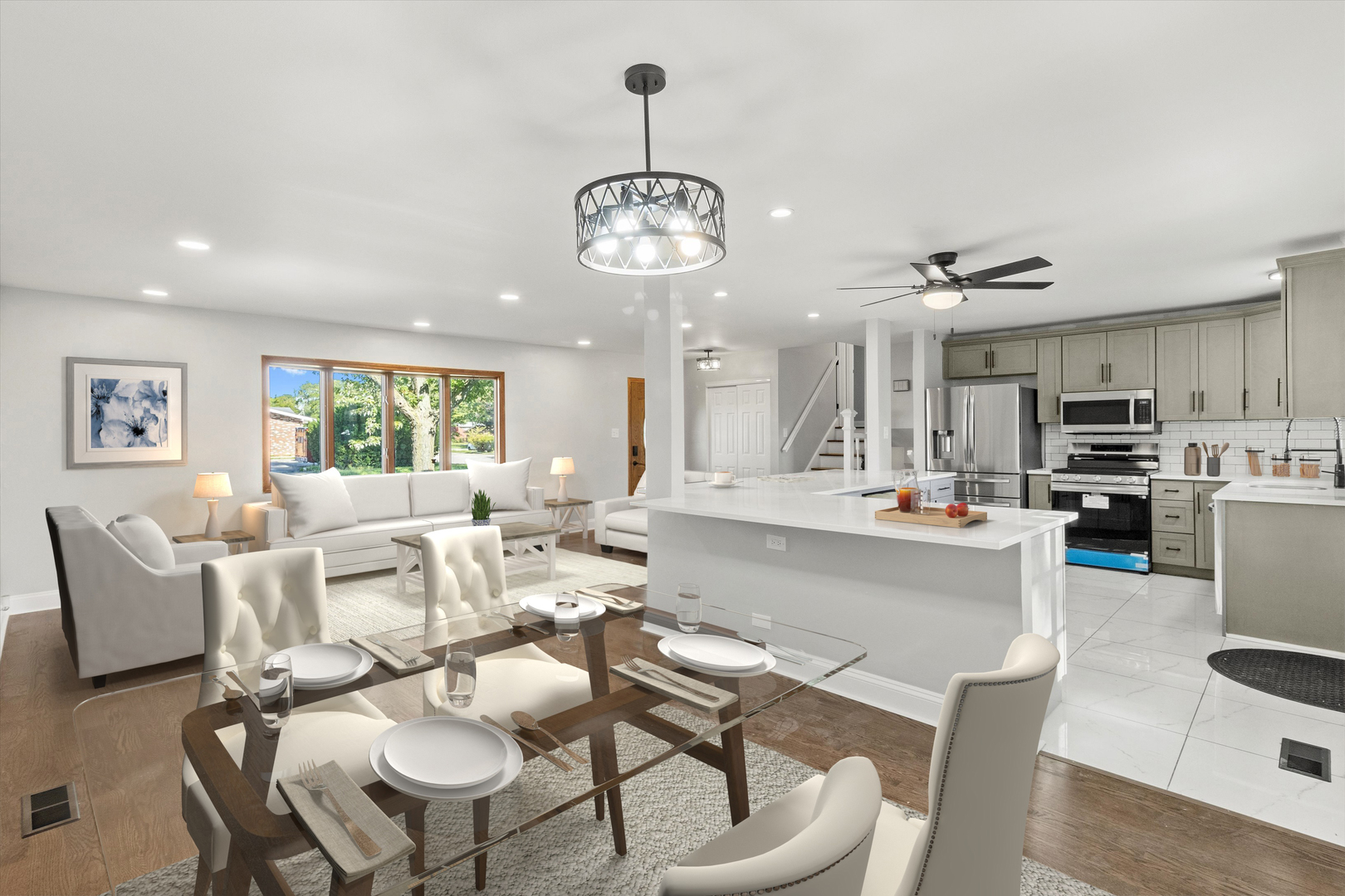 325 Indiana Street Park Forest, IL 60466 - Photo 9 of 28 a large kitchen with a table and chairs