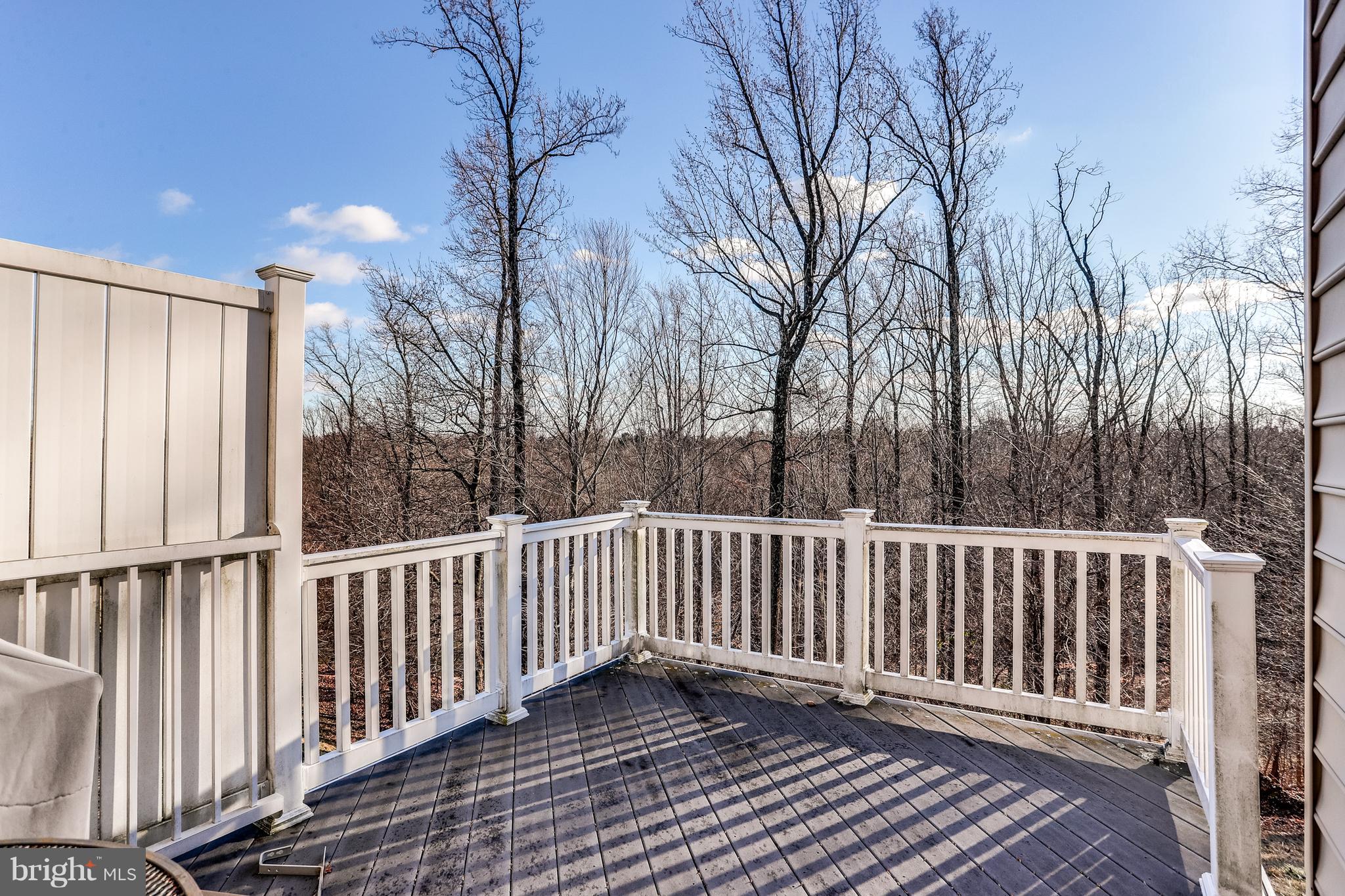 8323 Meadowsweet Road Pikesville, MD 21208 - Photo 43 of 46 Rear deck facing woods