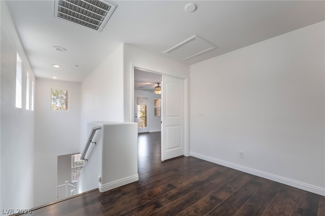 3175 Via Seranova Henderson, NV 89044 - Photo 18 of 45 This bright and airy landing offers a spacious feel with rich hardwood flooring and abundant natural light.