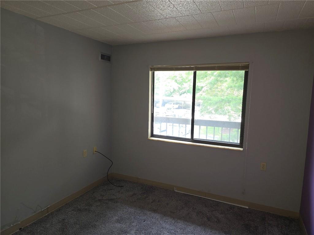 1987 Centurion Drive, Unit 202 Pittsburgh, PA 15221 - Photo 16 of 27 an empty room with a window