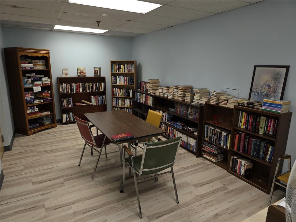 1987 Centurion Drive, Unit 202 Pittsburgh, PA 15221 - Photo 20 of 27 a view of a dining room with furniture and wooden floor