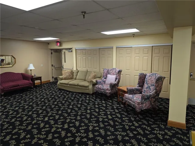a bathroom with a shower and a toilet