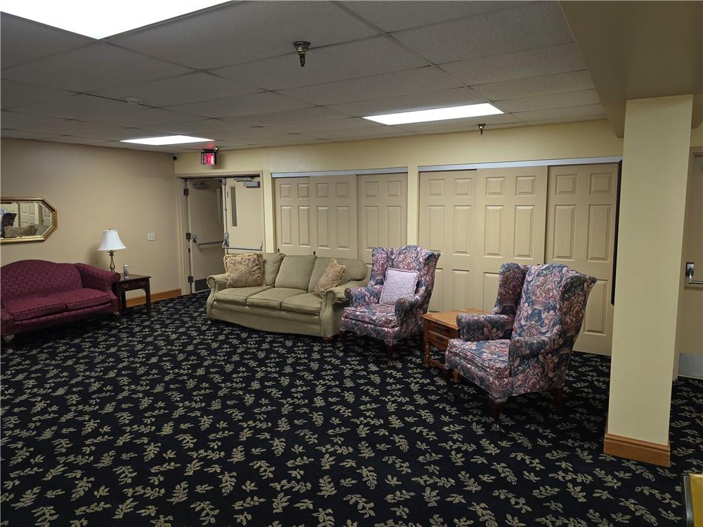 1987 Centurion Drive, Unit 202 Pittsburgh, PA 15221 - Photo 23 of 27 a living room with furniture