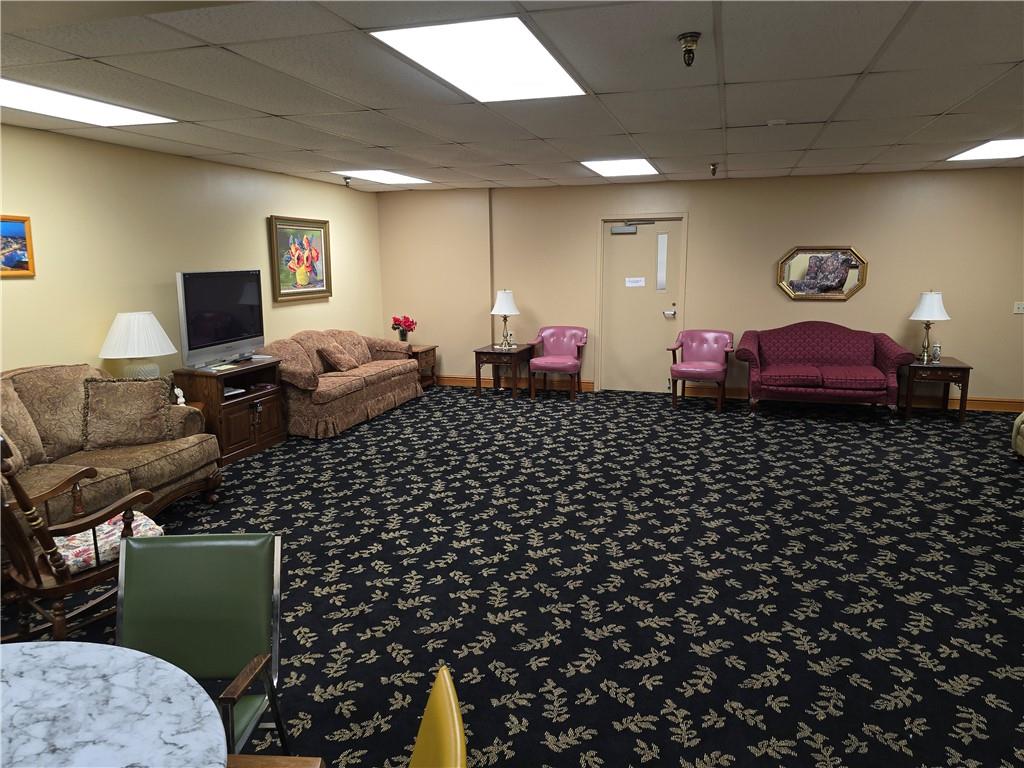 1987 Centurion Drive, Unit 202 Pittsburgh, PA 15221 - Photo 24 of 27 a living room with furniture