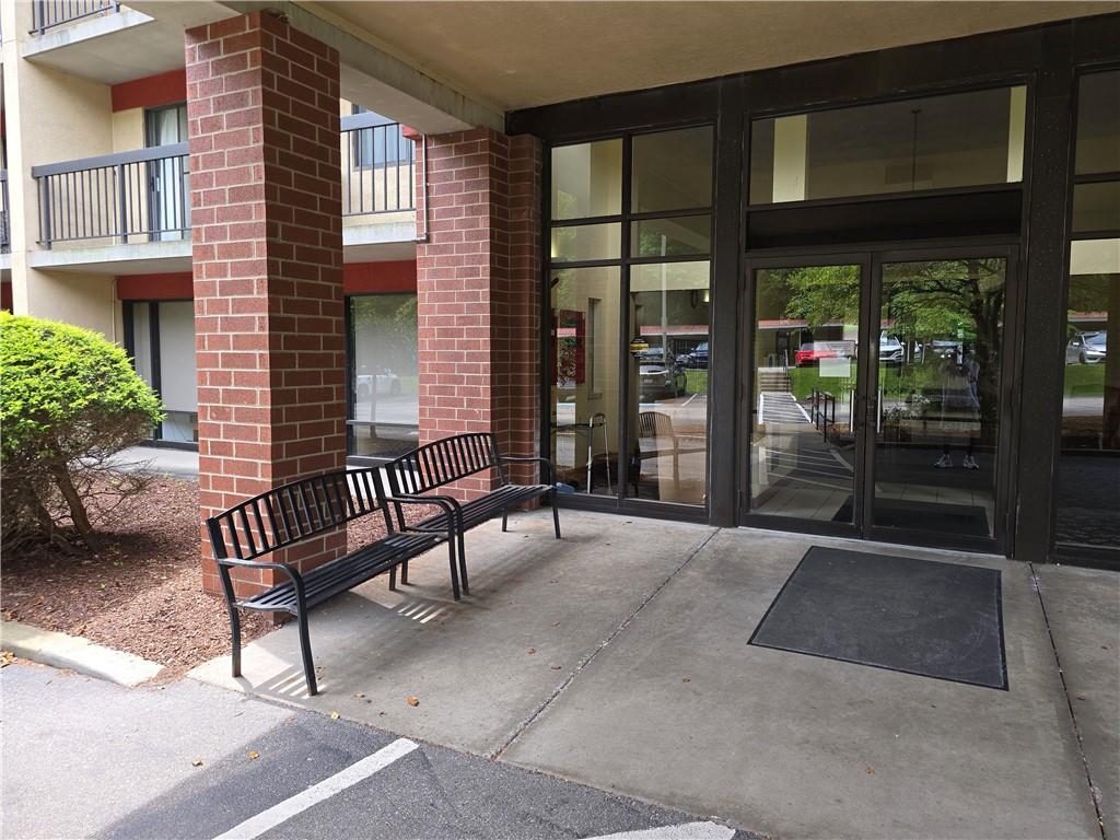 1987 Centurion Drive, Unit 202 Pittsburgh, PA 15221 - Photo 3 of 27 a view of two chairs in the patio