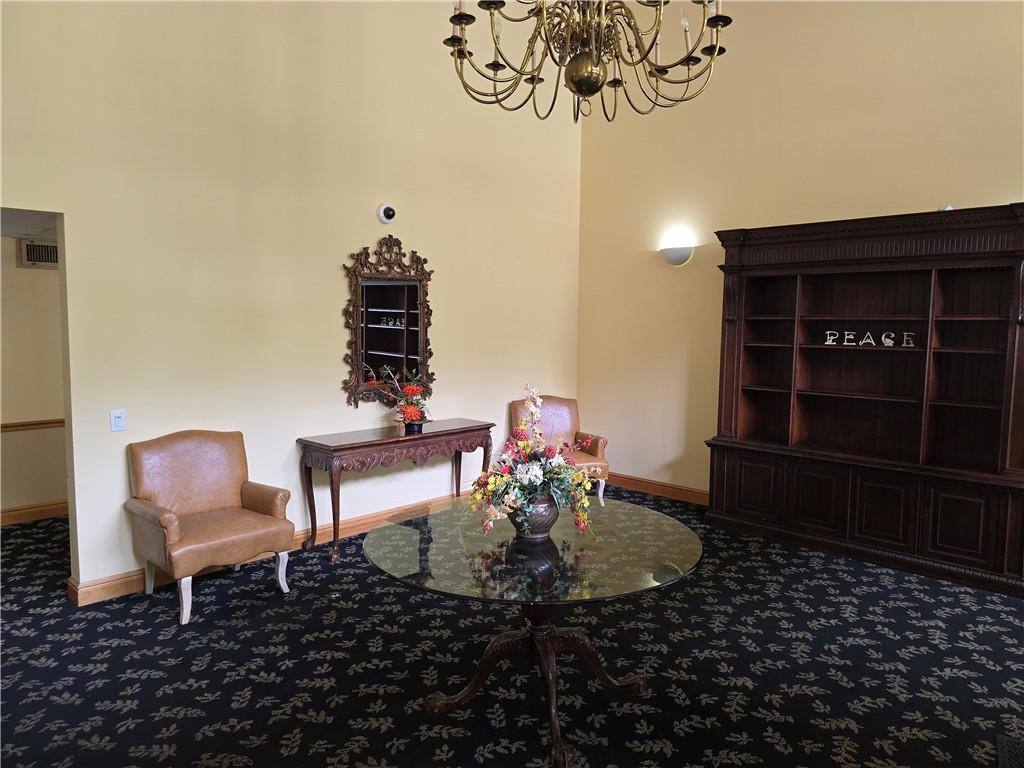 1987 Centurion Drive, Unit 202 Pittsburgh, PA 15221 - Photo 5 of 27 a view of a dining room with furniture