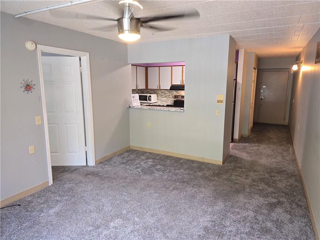 1987 Centurion Drive, Unit 202 Pittsburgh, PA 15221 - Photo 8 of 27 wooden floor in an empty room