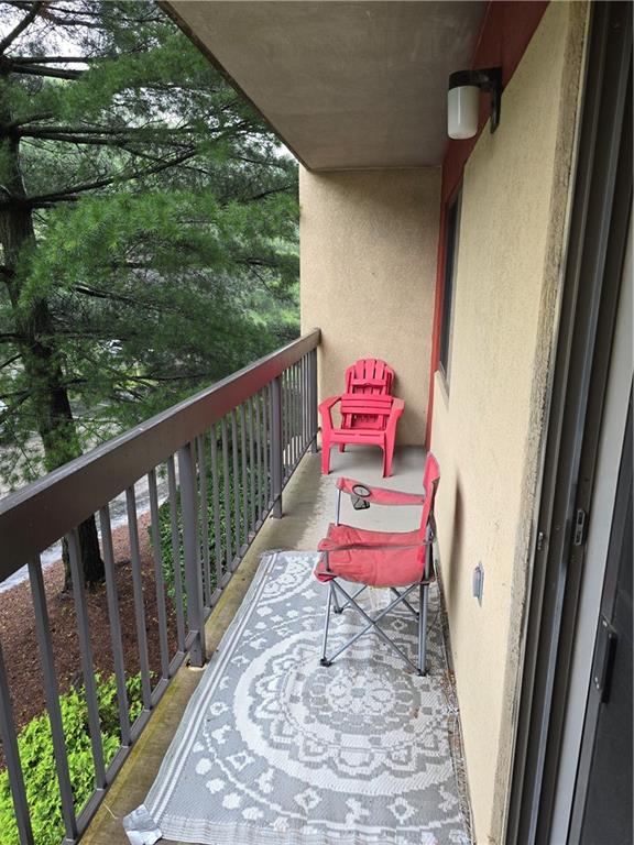 1987 Centurion Drive, Unit 202 Pittsburgh, PA 15221 - Photo 9 of 27 a view of a wooden bench in a balcony