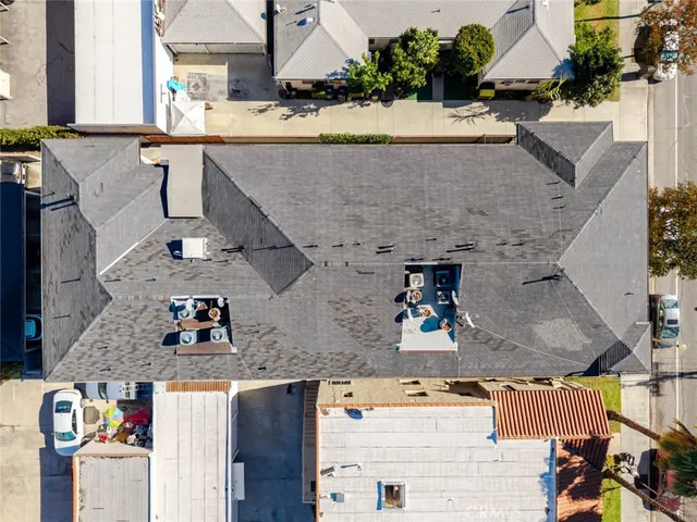 an aerial view of houses with outdoor space